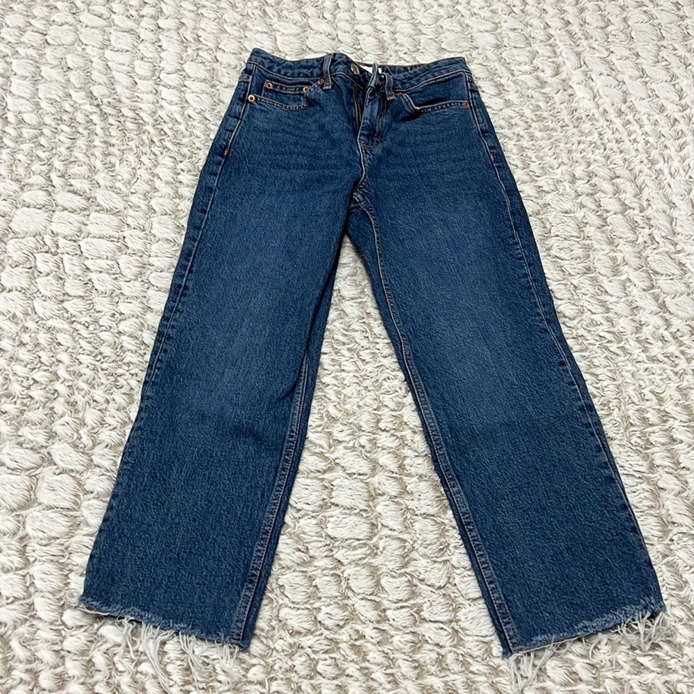 I am selling a pair of Topshop denim jeans.